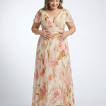A V-neck, short-sleeve, floral chiffon maxi dress in cream with pink and tan roses, featuring a ruched bodice.
