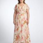 Woman wearing a V-neck, short-sleeve maxi dress in cream chiffon with a pink and brown watercolor floral print.